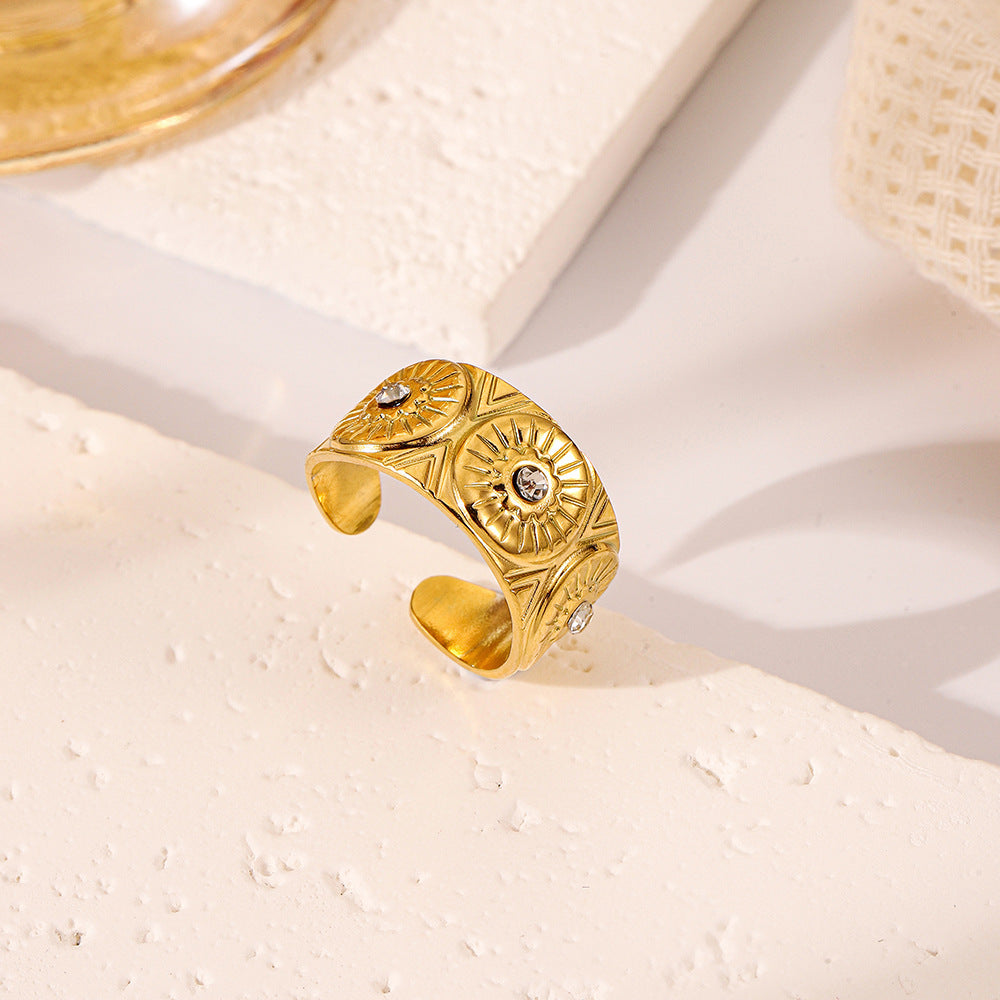 Bague ouverte en or, sertie de diamants