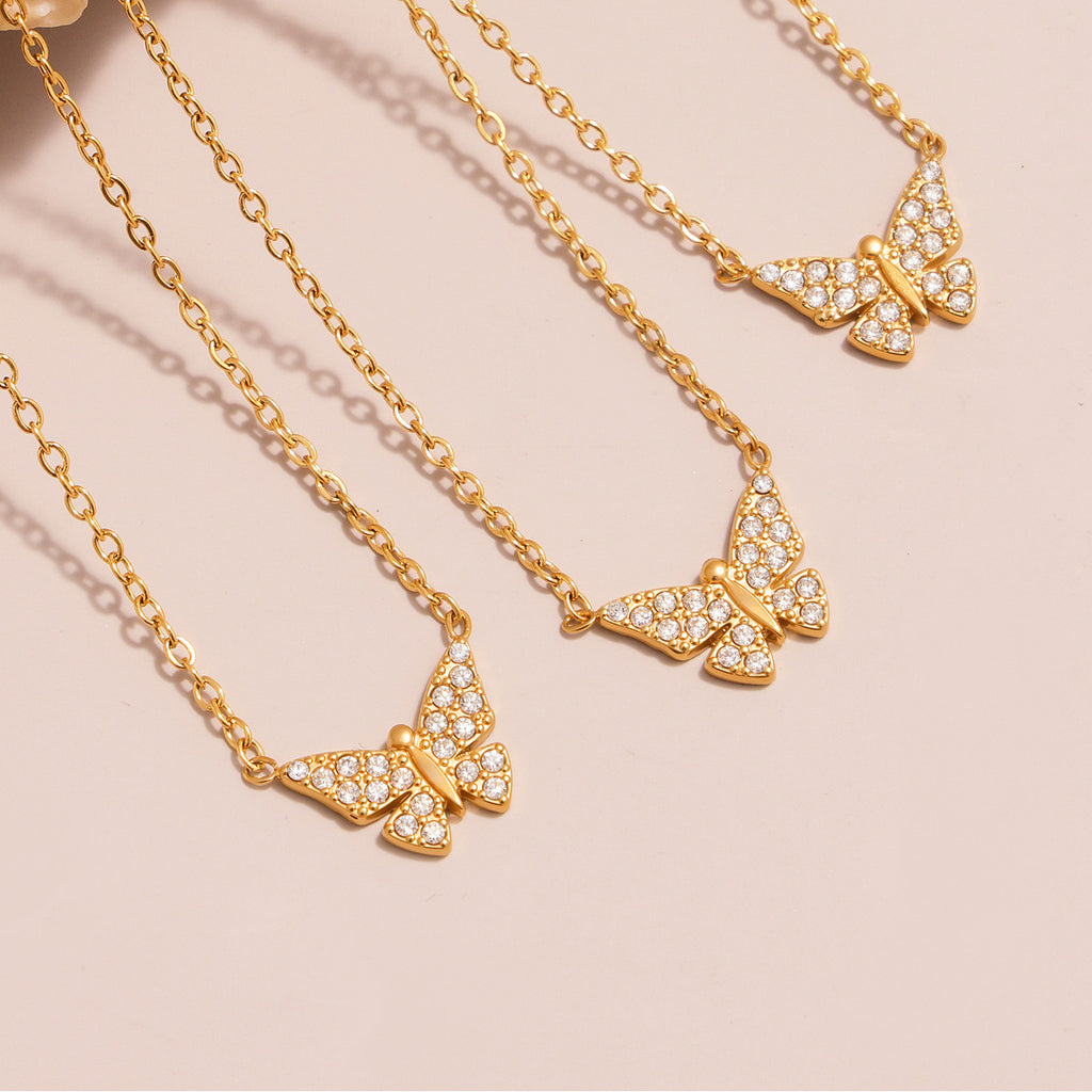 Collier et bracelet papillon entièrement sertis de diamants